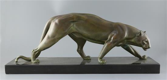 Irene Rochard. A French Art Deco bronze model of a prowling panther, width 26.5in. depth 7in. height 10.5in.